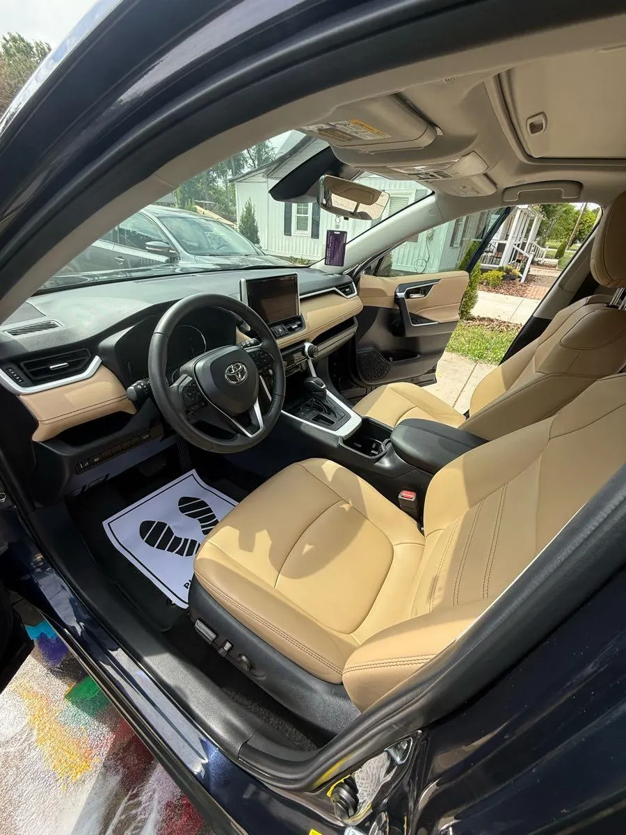 Clean tan Toyota interior after detailing