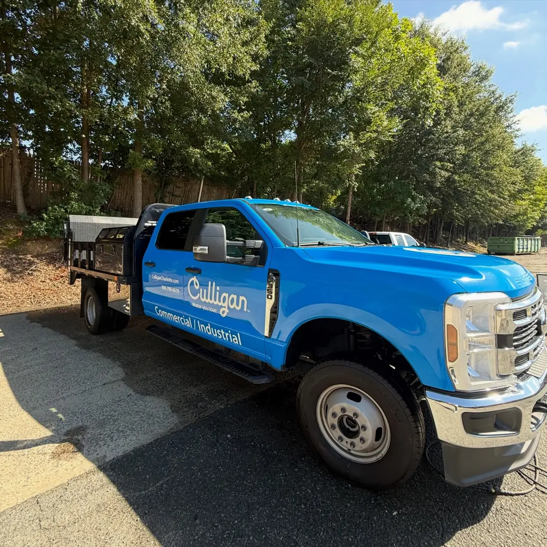 Blue Ford F-350 commercial work truck after an exterior detail